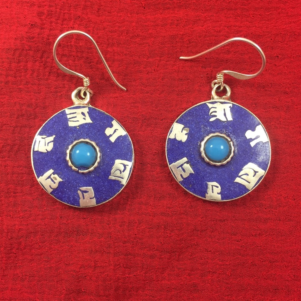 Handcrafted white metal earrings